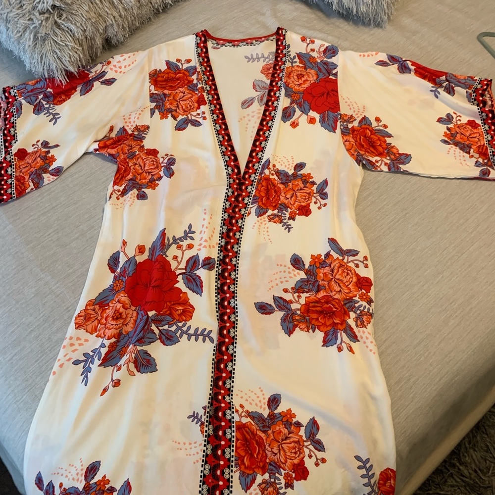 Kimono beach cover up or can be worn as a robe. White with red,orange and blue